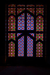 Colorful stained glass window in a mosque in Yazd, Iran