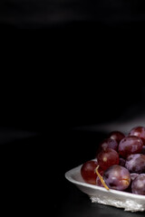 fresh grapes in isolated black background
