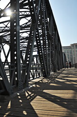 Waibaidu Bridge,Shanghai,China.Asphalt road under the steel construction of a city bridge on a...