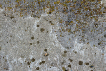 Concrete surface with multi colored round stains.