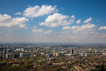 Obraz premium Almaty, Kazakhstan's largest metropolis, is set in the foothills of the Trans-Ili Alatau mountains. It served as the country's capital until 1997 and remains Kazakhstan's trading and cultural hub.