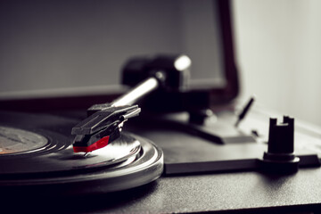 close up of a playing with a record