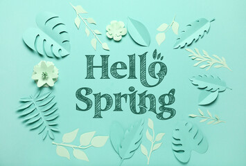 Fototapeta na wymiar Text HELLO, SPRING, paper flowers and leaves on light blue background