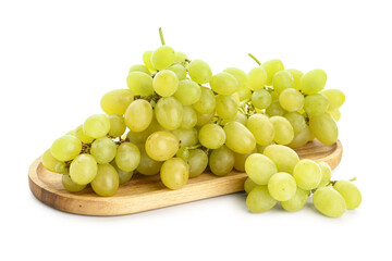 Wooden board with fresh green grapes on white background