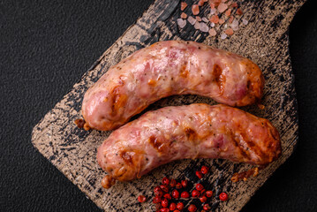 Delicious grilled chicken or pork sausages with salt and spices