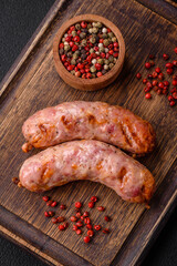 Delicious grilled chicken or pork sausages with salt and spices