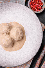 Delicious meatballs from minced chicken or turkey with sour cream sauce