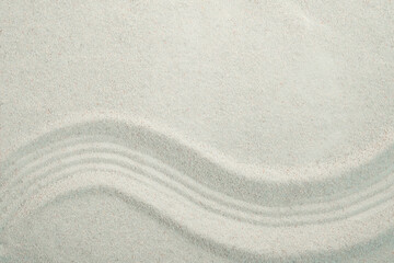 Top view of background and backdrop on sand The concept of balancing stones in a Japanese Zen garden