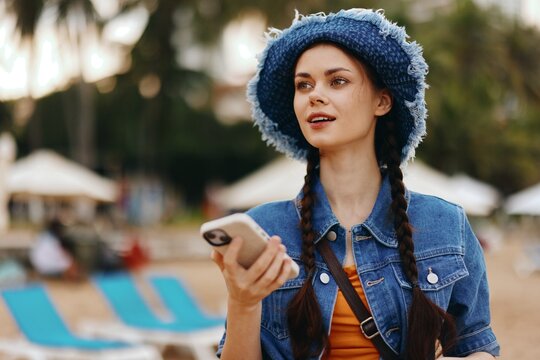 Stylish Female Using Smartphone Outdoors, Enjoying City Lifestyle