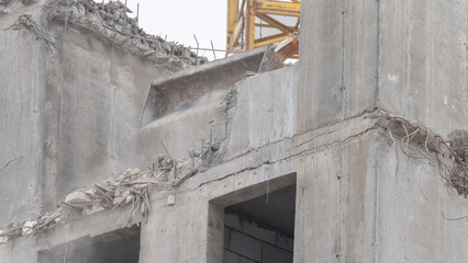 Dismantling of an unfinished monolithic building, dismantling the building, Demolition of the...