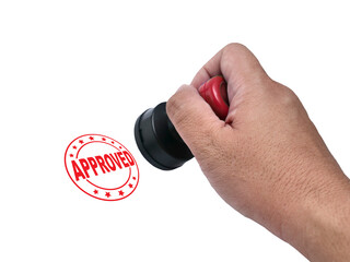 Approved, hand holding red handled round rubber stamp, top view isolated on white