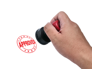Approved, hand holding red handled round rubber stamp, top view isolated on white