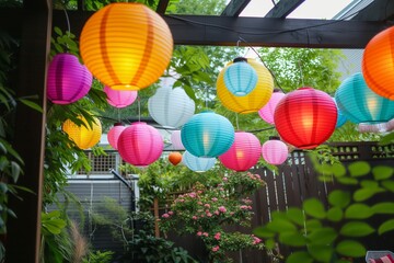 colorful paper lanterns above garden patio - obrazy, fototapety, plakaty
