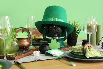 Festive table serving with leprechaun's hat and decorations for St. Patrick's Day celebration