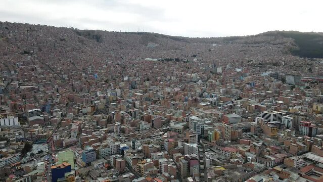 Aerial adventure: Plaza Murillo, La Paz skyline unfolds as the drone gracefully moves forward.