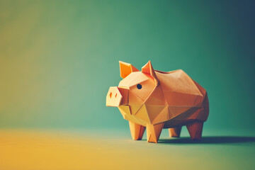 origami pig on a plain colored background
