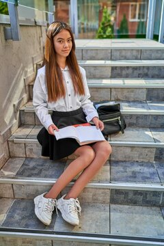Girl Is Sitting Stairs Near School Learning Poem