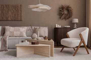 Interior design of modern living room with stylish sofa, armchair and furnitures, beautiful...