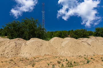 Construction sand. Mountain of sand on construction site