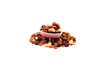 raw nuts on a white background. raw nuts in heart shaped bowl