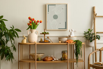 Warm and cozy composition of easter living room interior with mock up poster frame, vase with...