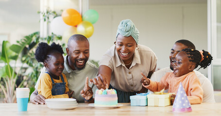 Black family, birthday cake and candles for children to celebrate with parents at a table. African woman, men and happy kids at home for a party, quality time and bonding or fun with love and care - obrazy, fototapety, plakaty