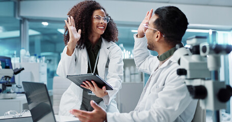 Science, teamwork and high five with laptop in laboratory for test breakthrough, pharmaceutical...