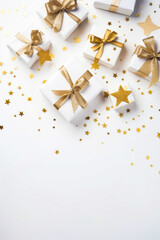 Group of white presents with gold stars on them and white background.