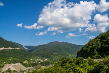 Clouds, blue sky and mountains