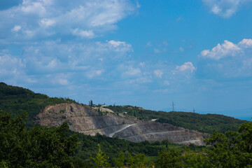 Fototapeta premium Mining mine, open pit for the extraction of minerals. Selective focus.