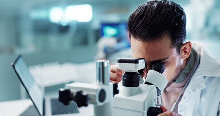 Microscope, man or scientist in research laboratory for medical test or biotechnology development....
