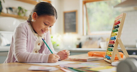 Education, writing and happy girl child in a kitchen with maths, homework or counting practice in her home. Learning, creative and female kid smile while drawing on a table for homeschool math lesson