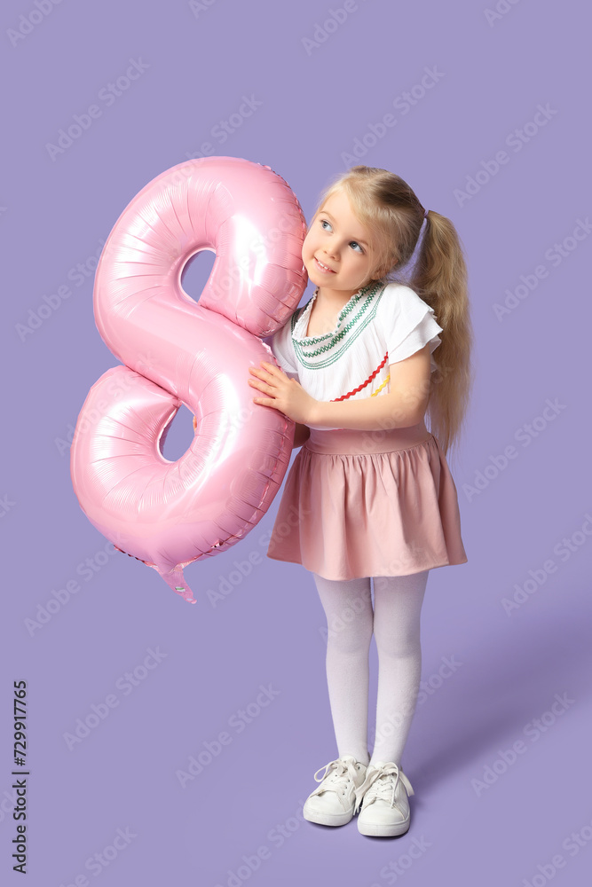 Wall mural Cute little girl with pink air balloon in shape of figure 8 on lilac background. International Women's Day