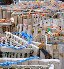 Colorful nylon rope used to lower and raise wooden lobster traps into and out of the waters around Halifax Nova Scotia - 729925307