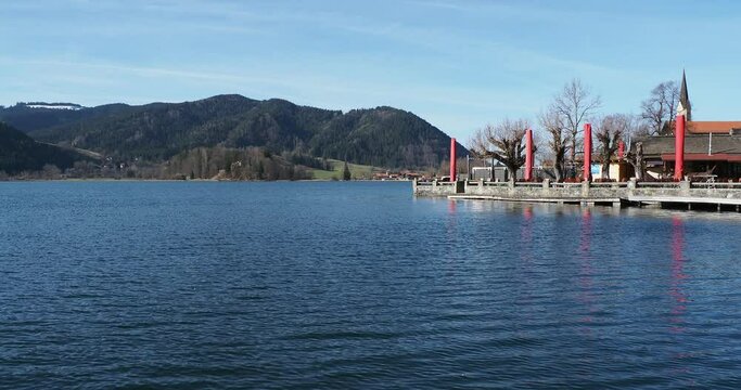 Lake Schliersee in Upper Bavaria with views of Freudenberg to the north, the slopes of Aschberg, Krainsbergkogel and Rainer Berg from the walkway along the eastern shore