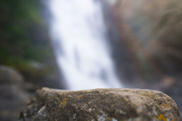 empty stone on thebackground of waterfall © avtk