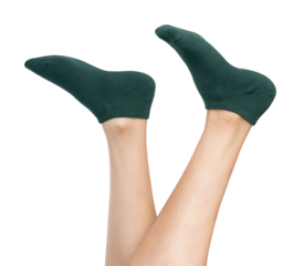 Woman wearing green socks on isolated white background.