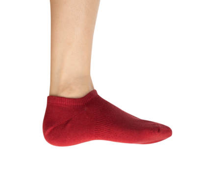 Woman wearing red socks on isolated white background.
