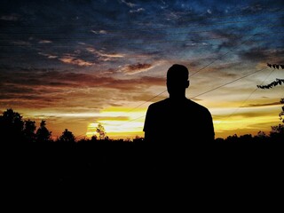 Fototapeta premium silhouette people standing alone