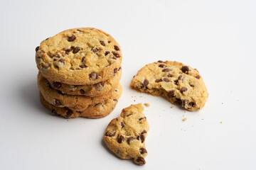 Biscuits with chocolate chips on white background