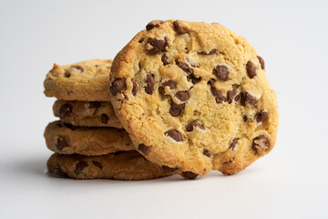 Biscuits with chocolate chips on white background