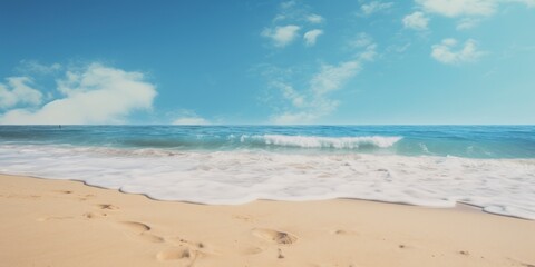 Fototapeta na wymiar Beach background with blue sea and sand