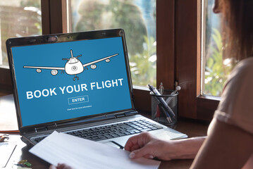 Flight booking concept on a laptop screen