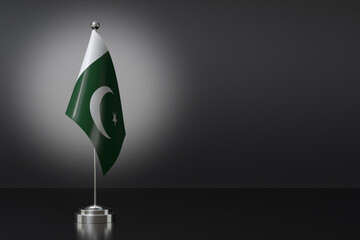 Small Pakistan Flag in Front of Black Background, 3d Rendering - obrazy, fototapety, plakaty