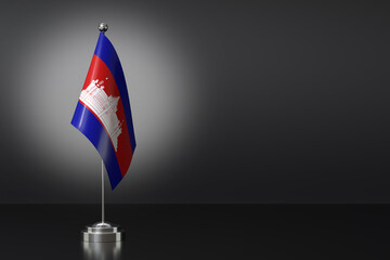 Fototapeta premium Small Cambodia Flag in Front of Black Background, 3d Rendering