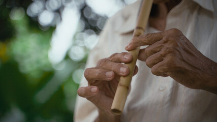 Playing handmade instrument  © pranshu