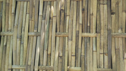 the texture of woven dry bamboo to be used as a wall. concept background