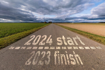 sign 2023, 2024 and start on asphalt road highway with sunrise or sunset sky background.  concept of  destination in future, freedom, work start, run, planning, challenge, target, new year