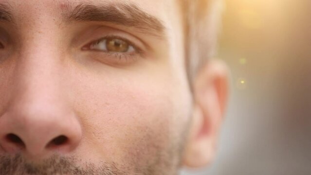 Image of man's brown eye close up.