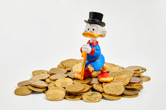 Watching Scrooge McDuck standing on coins heap